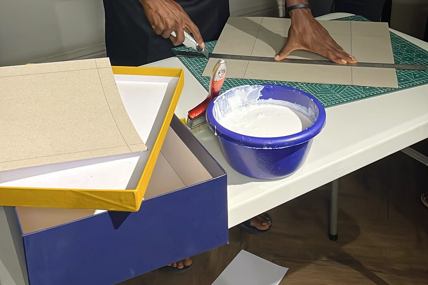 A rigid box taking shape during a hands-on workshop