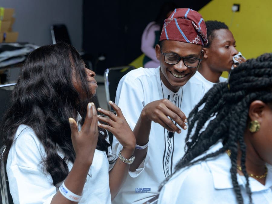 Members talking and laughing between sessions