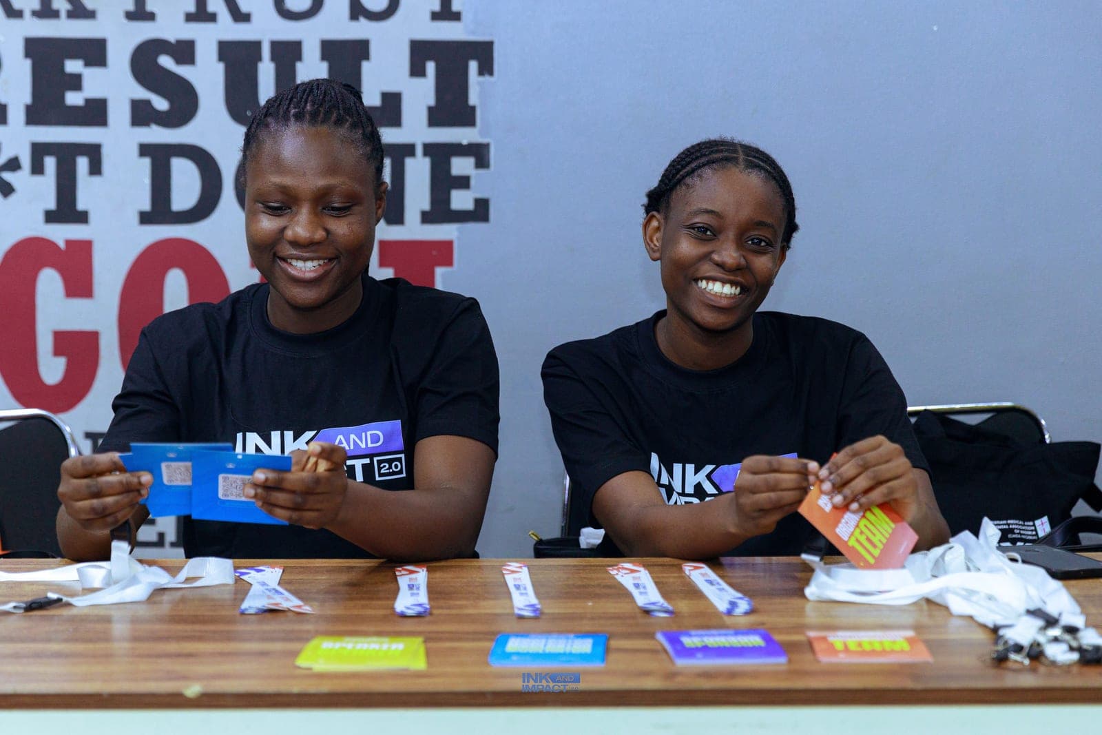 Members with branded materials at Ink & Impact 2.0