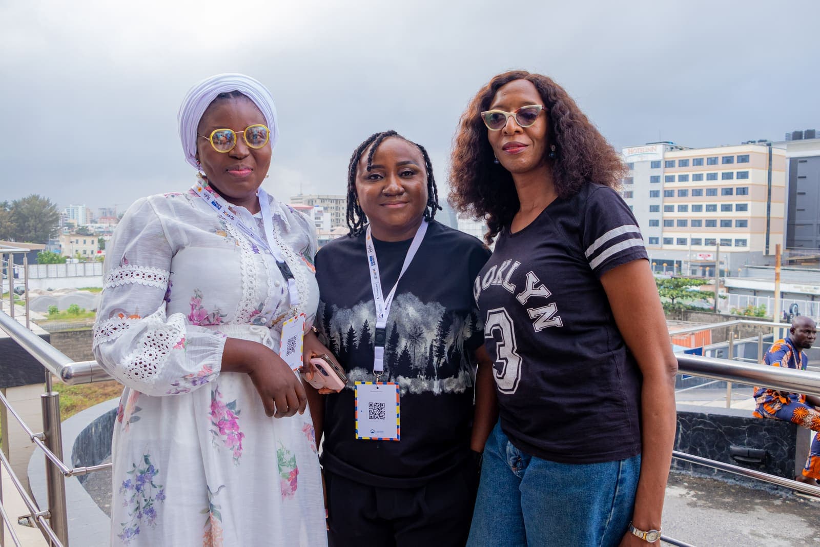 Three members outside the venue