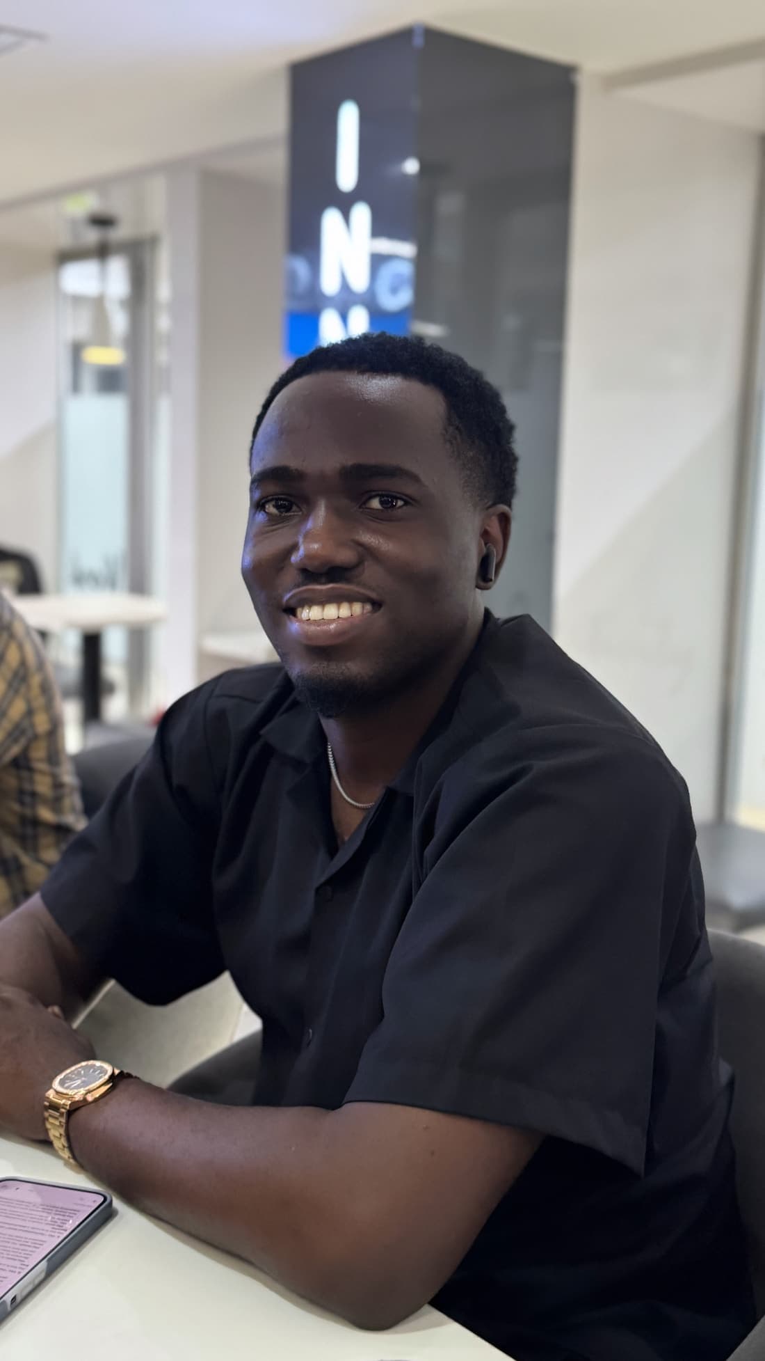 A cohort member at their desk