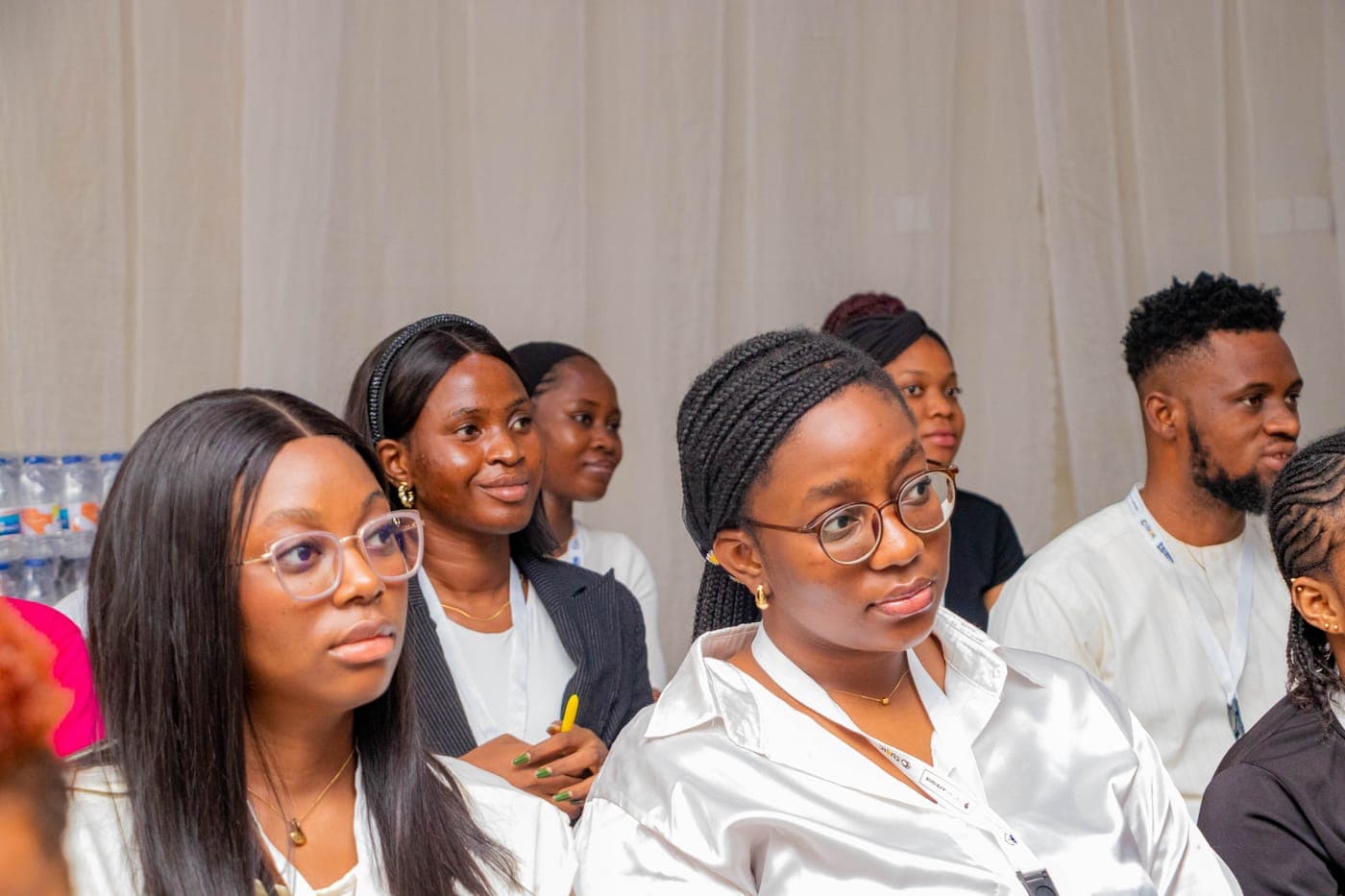 Members seated together through a session